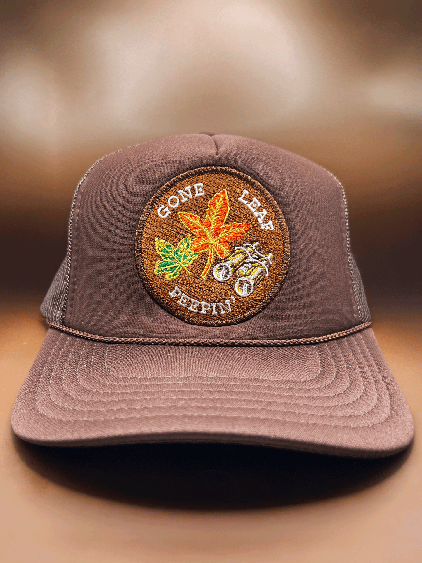 Gone Leaf Peepin' Trucker Hat